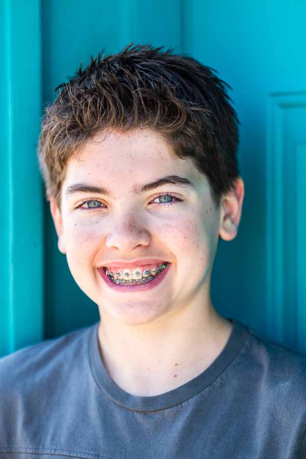 Littleton child and family photographer teen teenager boy braces urban session photography