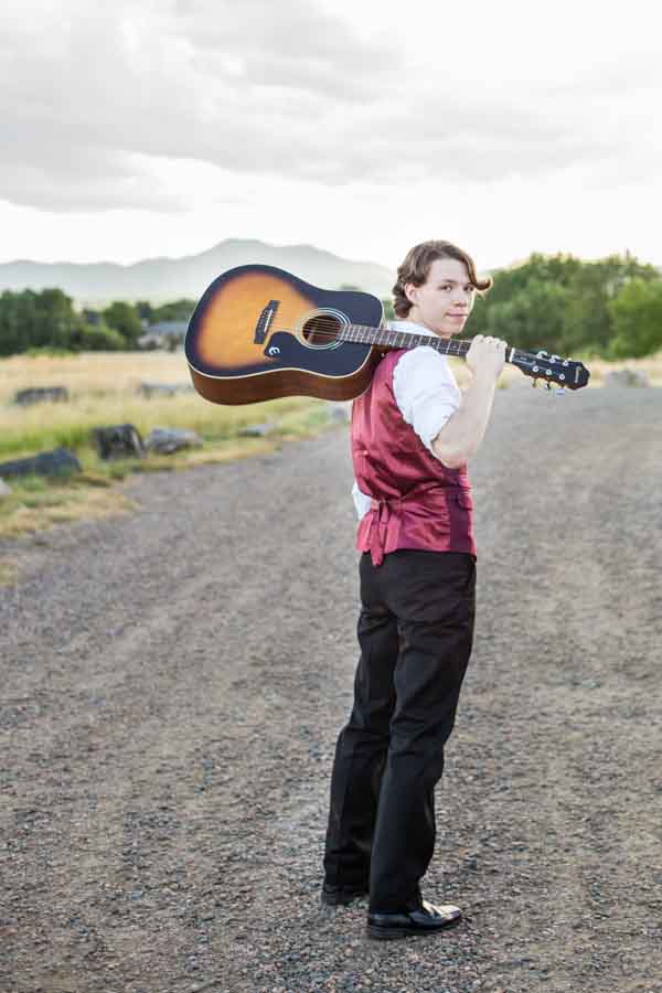 Littleton high school senior photographer in Colorado schools boy with a guitar