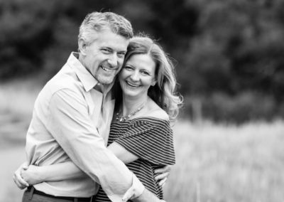 Littleton family photographer couple in love marriage married black and white snuggles