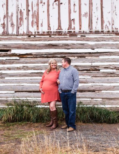 Littleton family maternity photographer old barn baby bump pregnancy pregnant mom to be Hildebrand Ranch Colorado photography husband and wife