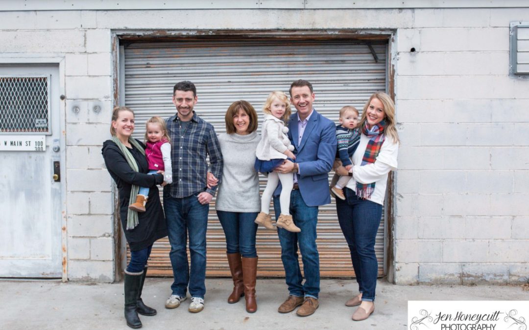 The large extended {O} family in Historic Downtown Littleton by urban and child photographer