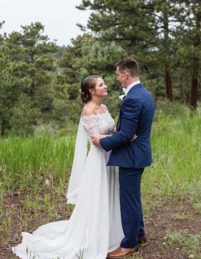 Littleton wedding photographer bride and groom Colorado mountains photography mountain views view Chief Hosa Lodge foothills summer marriage married husband and wife dress white in love