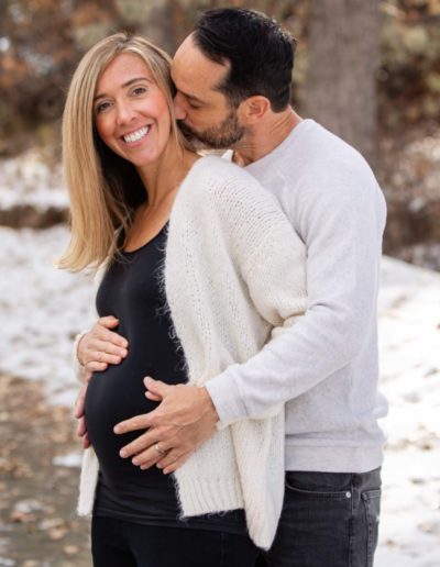 Littleton maternity family photographer baby bump mom to be expecting cute snow outdoor natural light photography in Colorado