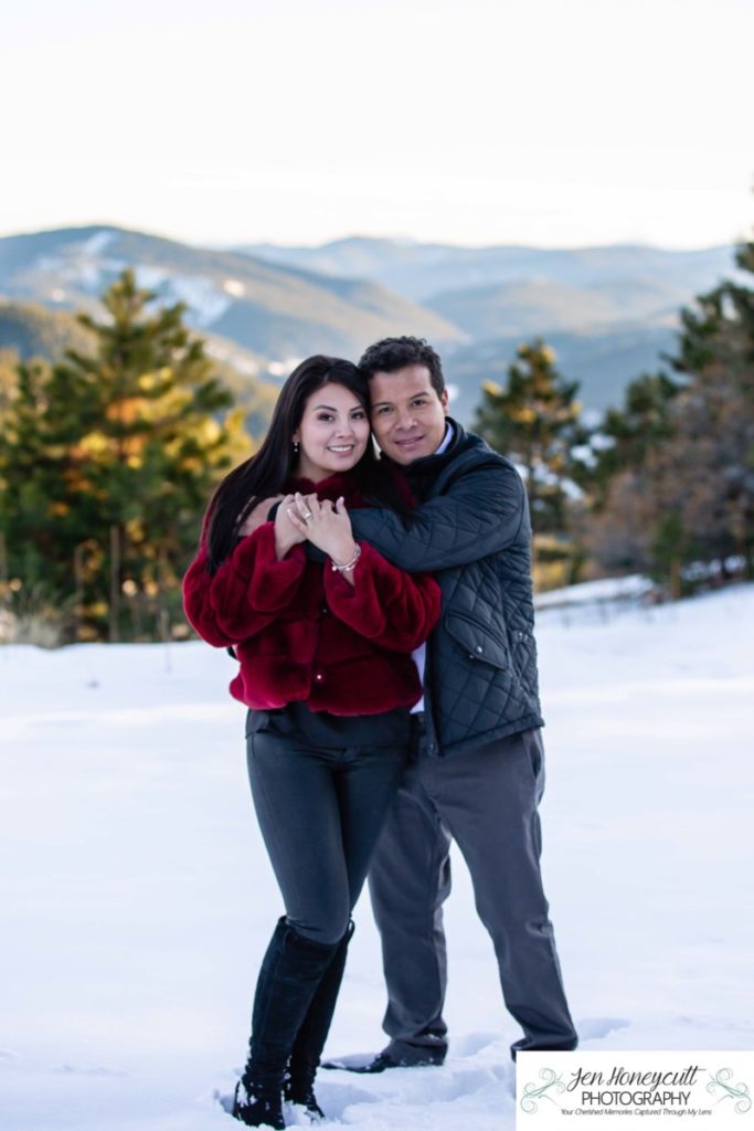 Littleton couple photographer family in love engagement session engaged future husband and wife marriage snow winter Colorado mountains mountain view golden hour sunset cute