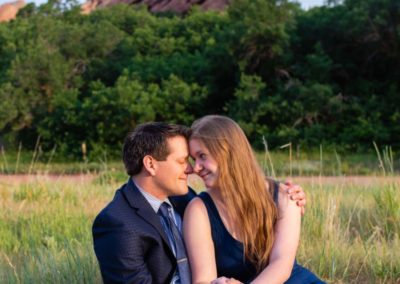 Littleton wedding photographer engaged engagement photo session in love couple red rocks rock formations South Valley Open Space park Colorado