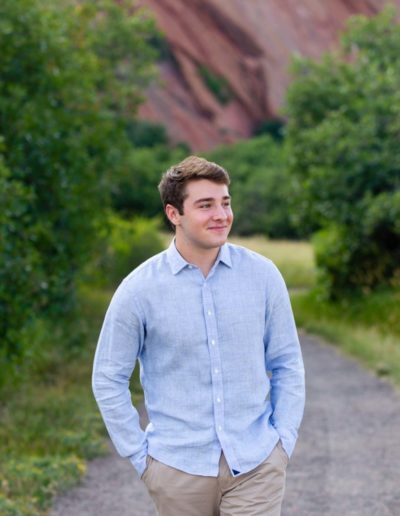 Littleton high school senior photographer in Colorado at Roxborough State park red rocks rock formations boy football lacrosse athletic Highlands Ranch Mountain Vista teen teenager Audubon Society college bound natural light photography