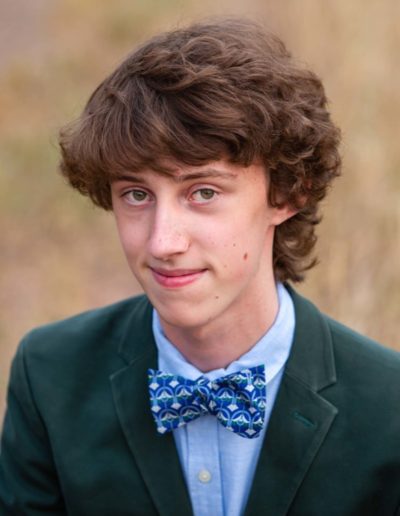 Littleton high school senior photographer in Colorado South Valley Open space park red rocks bow tie boy musical band Chatfield handsome