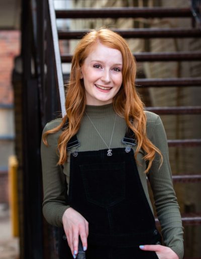 Littleton high school senior photographer in Colorado Columbine red head urban city natural light photography