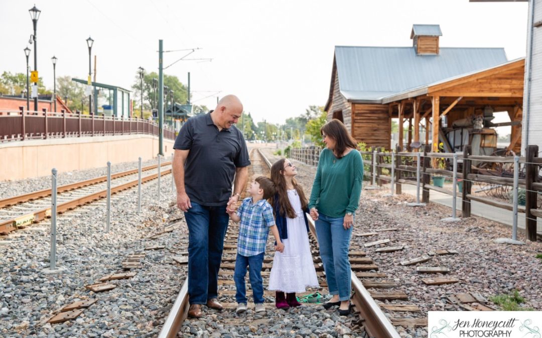 The {K} family of 4 in Olde Town Arvada by Littleton urban setting photographer