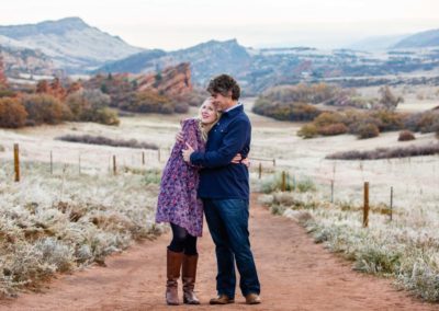 Littleton family photographer in Colorado South Valley Open Space park Ken Caryl red rocks rock formations boys brothers fall photo session cold frost winter mother father sons sunset photography