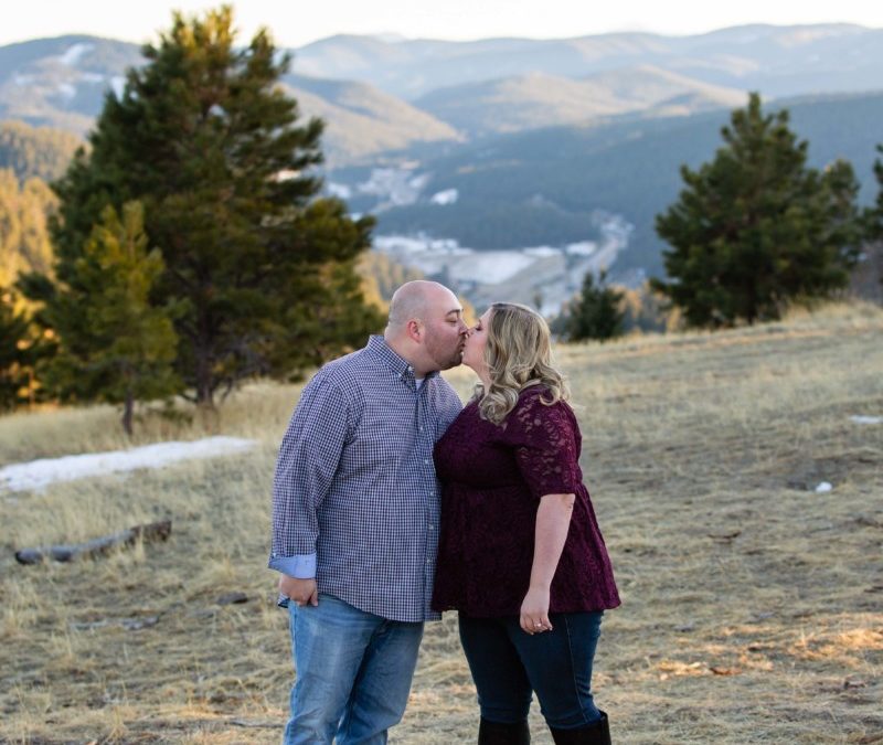 Travis & Ashley’s engagement photo session at Mt. Falcon park by local Littleton family photographer