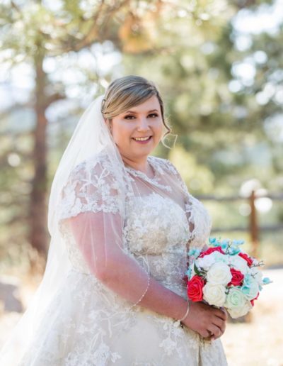 Littleton wedding photographer Christie's of Genesee park foothills spring marriage bride and groom husband wife man woman white dress first look 1st bridal party veil flowers photographer Colorado mountains ceremony