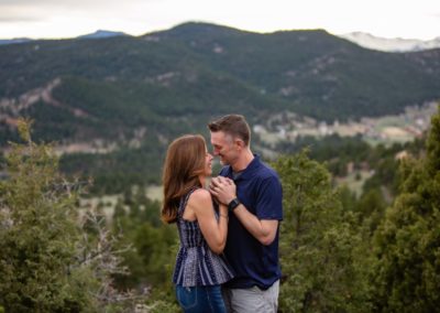 Littleton family photographer couple in love married marriage Mt. Falcon park Colorado mountains husband and wife sunset photo session