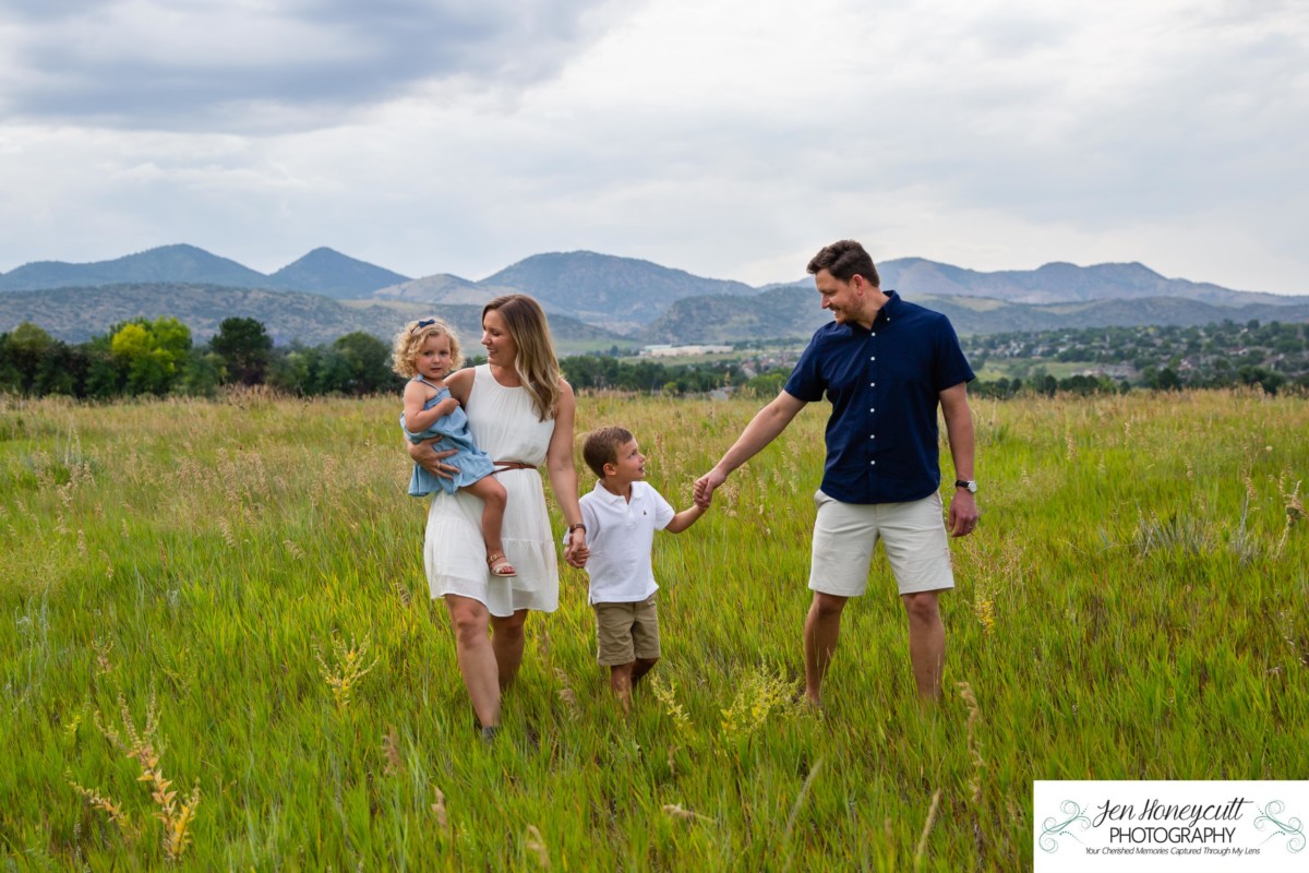 Littleton family and child photographer in Colorado photography mini portrait photo session siblings big brother little sister sunset field Ken Caryl Valley area foothills