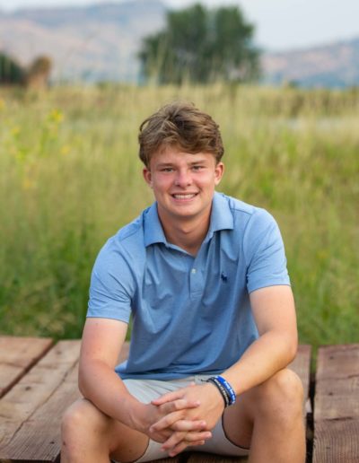 Littleton family photographer high school senior photography South Valley Open Space Park Ken Caryl sunset Colorado Class of 2022 Mullen lacrosse player siblings brother sister red rocks
