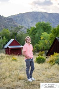 Littleton high school senior photographer teen boy Clear Creek History Park in Golden Colorado ice hockey lacrosse player water river creek sunset foothills view