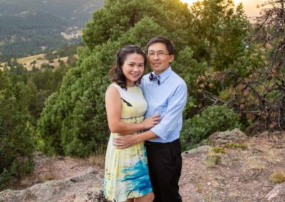 Littleton family photographer Mt. Falcon park in Colorado foothills mountain views kids mother father boy girl sisters brother Vietnamese grandmother sunset photography