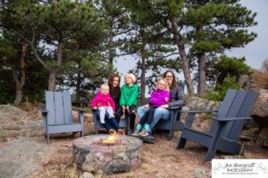 Littleton family photographer mountain camping views Evergreen firepit smores kids roasting marshmallows branding photo session outdoors tent ramble photography