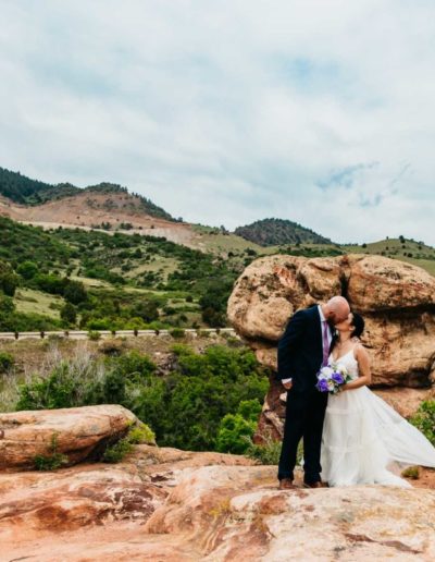 Littleton wedding photographer Willow Ridge Manor Morrison red rocks bride groom in love married marriage mr. mrs. bridesmaids groomsmen outdoor spring weather photography foothills Colorado white dress