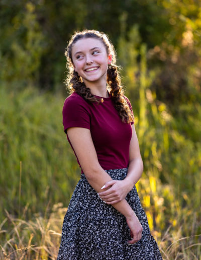 Littleton high school senior teen photographer girl fall class of 2023 Dakota Ridge volleyball player photography Lair O' the bear park sunset