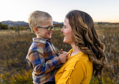 Littleton family photographer mini photo session Ken Caryl park neighborhood Colorado sunset photography baby girl sister big brother fall foothills view