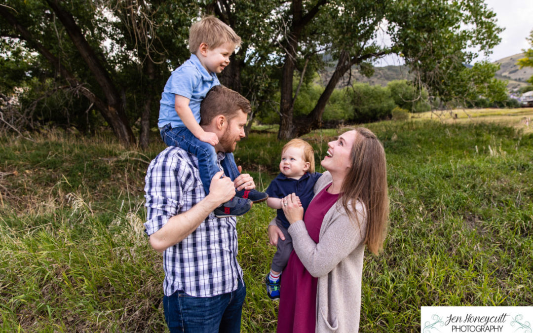 The {S} family of 4 at the Bradford-Perley House in the Ken Caryl Valley by Littleton photographer