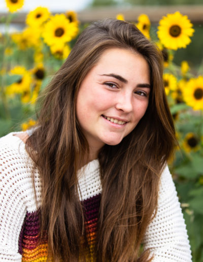 Littleton high school senior photographer sunflowers class of 2023 teen girl fall flowers photography Colorado