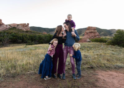 Littleton family photographer South Valley red rocks kids siblings mother father son daughter sunset photography Colorado foothills