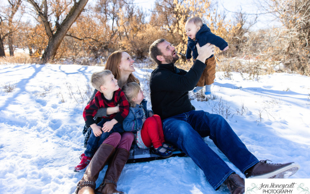 The {C} family of 5 at the *snowy* Stone House in Lakewood by Littleton photographer