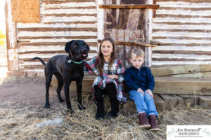 Littleton family photographer Hildebrand Ranch Colorado barn kids photography sunset dog brother sister fall