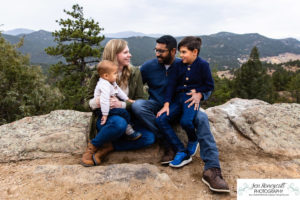 Littleton family photographer extended grandparents kids cousins cold snow Mt. Falcon sunset photography Colorado mountain views fall baby boys girls siblings