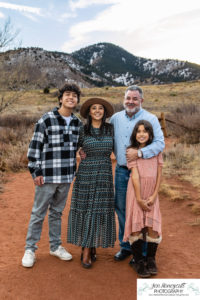 Littleton family photographer Red Rocks Amphitheatre kids teens brothers sister friends grandmother extended sunset photography fall Thanksgiving trip view Arizona foothills Colorado
