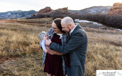 The {V} family of 3 with a baby at South Valley Open Space park by Littleton photographer