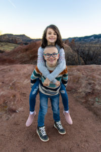 Littleton family photographer South Valley Open Space park sunset winter kids siblings photography red rocks