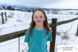 Littleton family photographer mini photo session photography snow kids mother father son daughter boy girl brother sister Colorado foothills winter