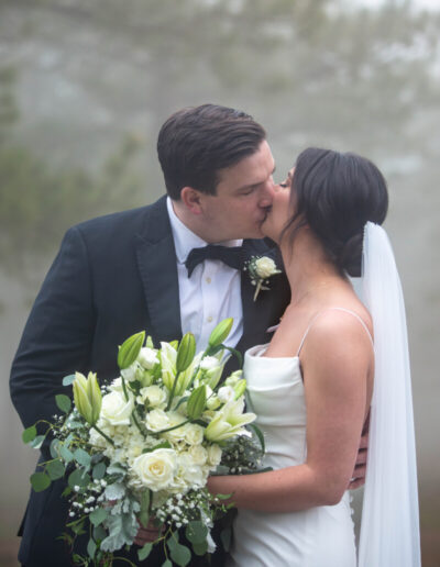 Littleton wedding photographer foggy Boettcher Mansion Colorado spring bride and groom bouquet dress photography